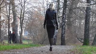 ANIA - a woman in leather in public