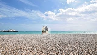 ECE Architecture install mirrored beach hut on English coastline