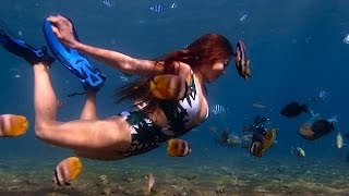 FISH FRENZY. Ivory - Tropical Underwater Model Shoot. Dauin Marine Reserve. Negros, Philippines