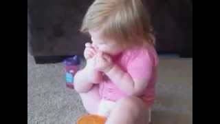 Toddler Eating Goldfish Crackers with Feet