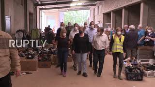 Germany: Angela Merkel and Armin Laschet visit town hit by catastrophic flood