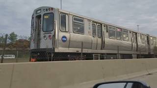 Passing a CTA Red Line train on the Dan Ryan Expressway.