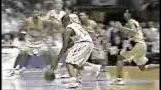 Vince Carter dunks over Tim Duncan