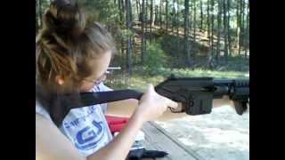 Sarah shooting an SU-16C