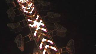 Drunk guy pukes on carnival ride twice