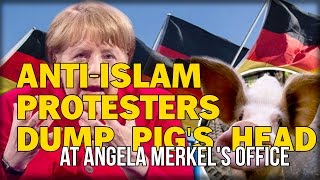 ANTI-ISLAM PROTESTERS DUMP PIG'S HEAD AT ANGELA MERKEL'S OFFICE