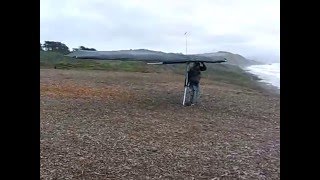 Hang Glider takes-off at Fort Funston cliff, San Francisco CA