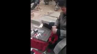 Заточка #ЦайДао на улице в Китае