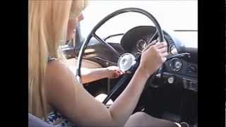 car cranking in white high heels sandals
