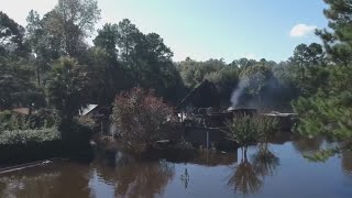 Drone video shows smoldering remains of Orange County home that burned during Imelda flooding