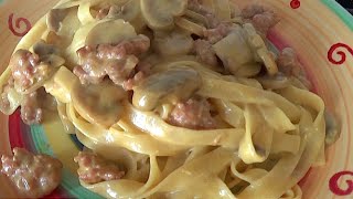 Tagliatelle with mushrooms and sausages