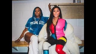 Lil' Kim calls out hater for dissing her tight latex suit