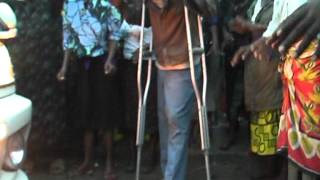 MARY KAGENDO FRANCIS PRAYING FOR DISABLED PERSON DURING MARATHON CRUSADE AT BAMBURI