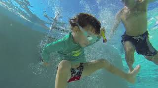 Kid Underwater Swimming