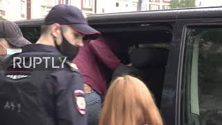 Russia: Journalist Roman Dobrokhotov escorted for questioning after police raid his home