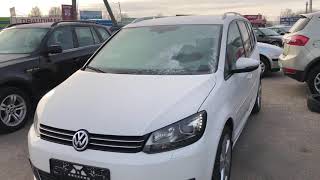 Белоснежный VW Touran 2012 года в отличном состоянии