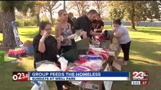 Group helps homeless people by providing warm meals at the park