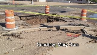Water main break floods Roswell street