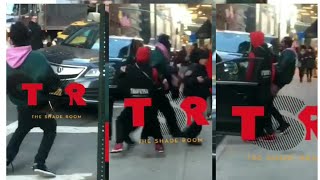 Desiigner pulls his pants down and runs up to swing on guy during a street altercation