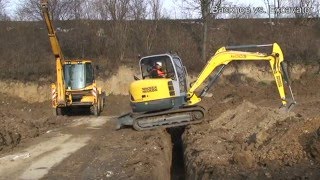 Компактный экскаватор против экскаватора погрузчика