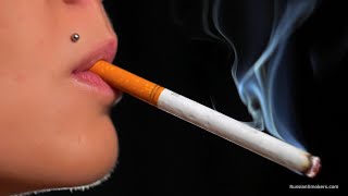 Smoking 100mm cigarette in this closeup video