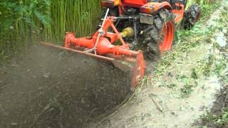 kubota b2420,chota tractor 24 hp...in wet paddy field