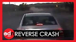 Suspected Drink Driver Speeds Along US Highway Before Losing Control and Reversing Into Police Car