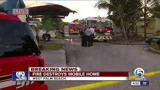 Mobile home fire extinguished near West Palm Beach