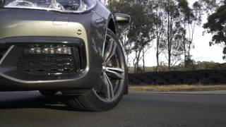 Luxurious BMW 740i Running Bridgestone Potenza S001