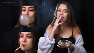 Bubblegum blowing and smoking two 120mm cork cigarettes