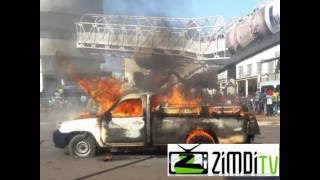 Harare CBD  burnt as anti riot police and MDCT youths activists clash