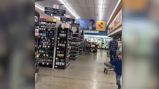 Deer runs through grocery store
