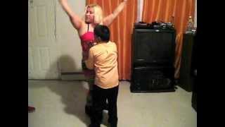 Dominican Republic mom dancing with her son in Newark, New Jersey