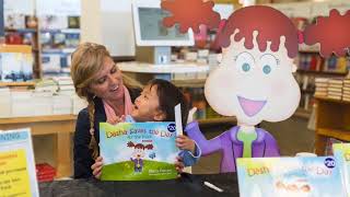 Anya Buys her first book! It's Dasha Saves the Day: At the Park - a true kindness hero!