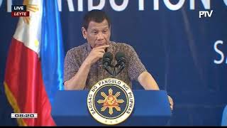 President Duterte at the ceremonial distribution of benefits to former rebels in Leyte