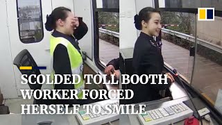 Scolded by driver, toll booth worker in China forces herself to smile