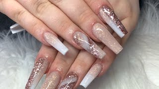 Long Nude And Rose Gold Acrylic Nails