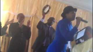 WORKER NELSON PREACHING IN TOP BONNET CITY MISSION