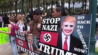 Pro and anti-Trump protesters confront each other outside rally