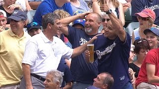 Fan loses beer to foul, booth buys another