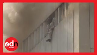 GRAPHIC CONTENT WARNING: People jump from 20-storey building in Pakistan to escape fire