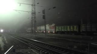 Электровоз 2ЭС10 (3ЭС10) с бустерной секцией и грузовым поездом