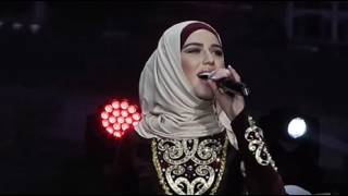 Зули Хусиева - Ирсе ю. (Нохчийн а, оьрсийн а текст)