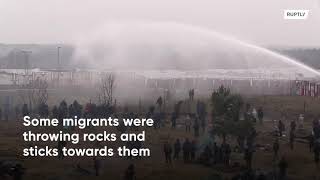 Polish forces use tear gas and water canons against migrants