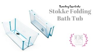 Splashing around in the Stokke Bath Tub (foldable, great for travel)
