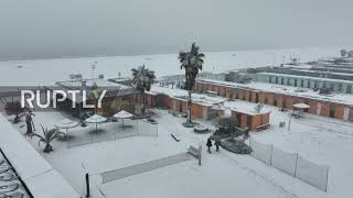 Italy: Snowfall blankets Rimini's famous seafront