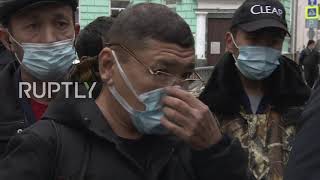 Russia: Uzbek citizens line up outside country"s embassy in Moscow to vote