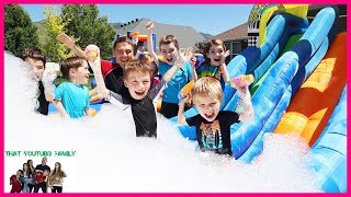 7 Second Squishy Challenge Down Giant Inflatable Water Slide! / That YouTub3 Family