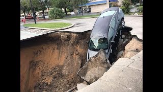 Florida sinkhole nearly swallows a car occupied by an elderly couple