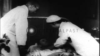 Medical check up of Allied prisoners of war at a Japanese camp HD Stock Footage
